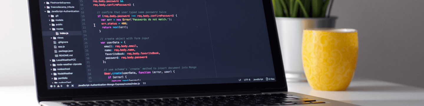 A laptop displaying CSS, representing old website design code.